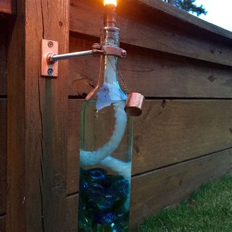 From Harvestmoonshoppes On Etsy Wine Bottle Torches Vases And