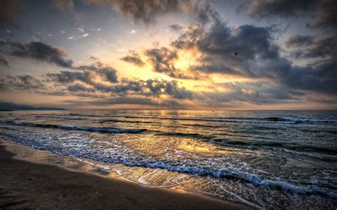 Sea Waves Beach Sand Sky Clouds Sunset Wallpaper