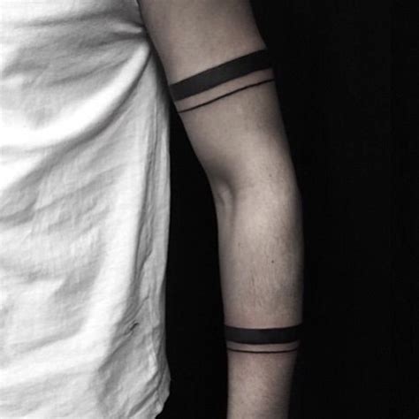 Double Solid Black Band Tattooed By Greg Golden Iron Tattoo Studio