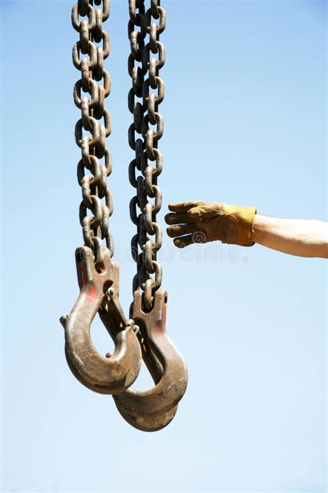 Long Chains With Hooks Hanging Vertically Against Blue Sky Stock Photo Image Of Close Hook