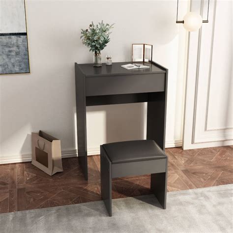 Vanity set with bench and 360° rotating rectangular mirror. How To Choose The Best Makeup Vanity Table For Small Room