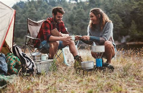 Happy Young Couple Camping High Quality People Images ~ Creative Market
