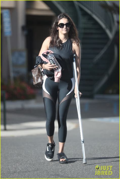 Nina Dobrev Steps Out On Crutches After Injuring Her Foot Photo