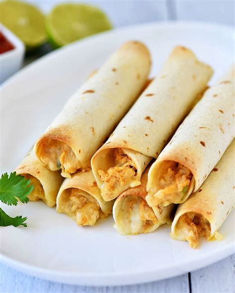 Baked Chicken Taquitos Are A Crispy Flour Tortilla Wrapped Around A Warm Center Of Creamy And