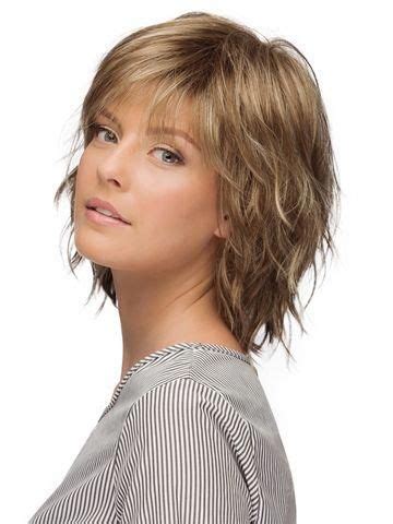 Wavy textured bob and bangs. 40 Stylish and Sassy Bobs for Round Faces in 2020 | Wavy ...