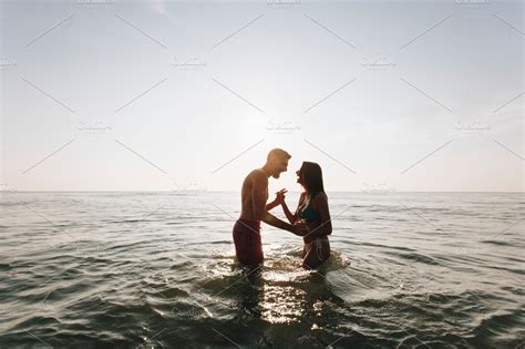 Romantic Couple In The Sea ~ People Photos ~ Creative Market