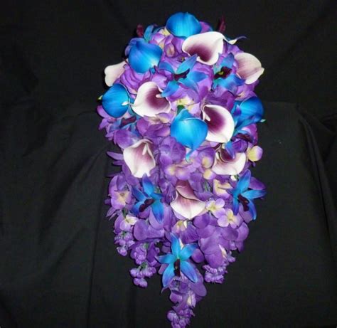cascading bridal bouquet royal blue and royal purple picasso callas purple blue galaxy orchids