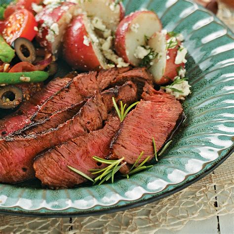 An inexpensive chuck steak is wrapped in foil and baked to perfection with onion soup mix, a bit of garlic, and a variety of vegetables. Easy Marinated Sirloin Steak Recipe | Taste of Home