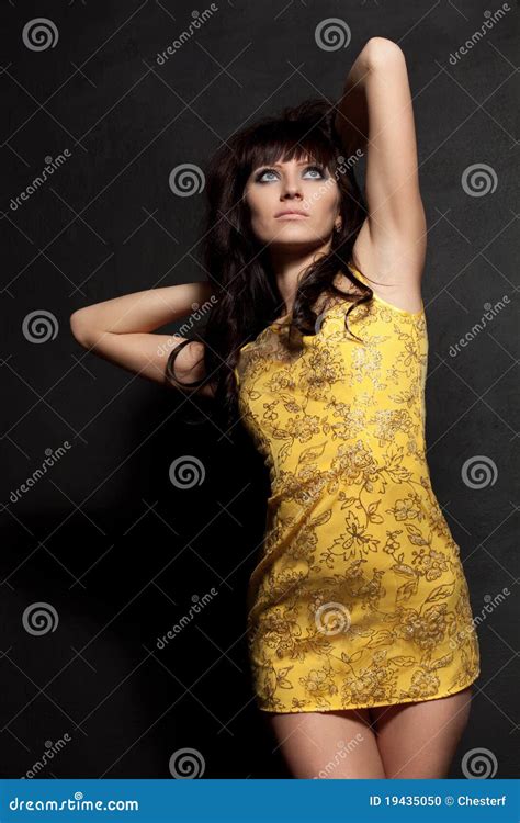Woman Posing Wearing Yellow Dress Stock Photo Image Of Sensuality