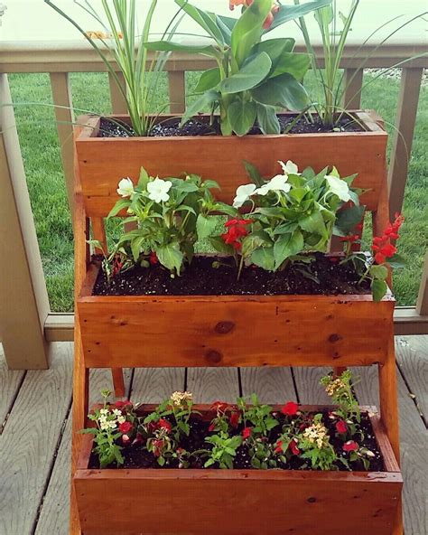 These are super easy to use and get hidden on the inside so you don't see any screws from the front, giving you a nice, clean. 3 tier raised cedar planter box | Tiered planter, Lawn and ...