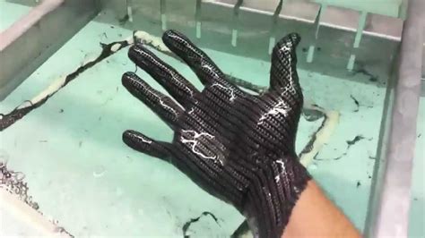 Hydrographics Dipping My Hand In Carbon Fiber Film Youtube