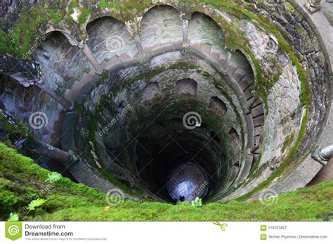 Stone Spiral Staircase In The Form Of A Well View From Above Stock