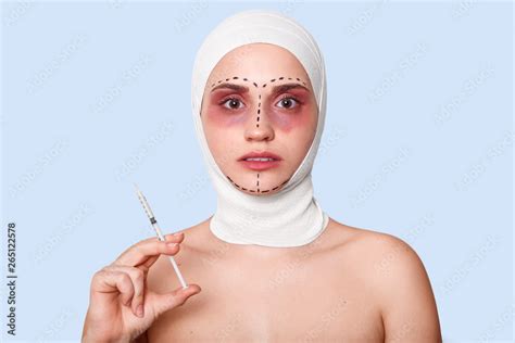 Photo Of Naked Woman In Clinic Lady Holds Syringe For Making Facial
