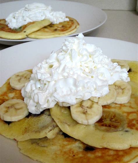 In a medium bowl, let the melted dark chocolate chips cool to room temperature, then use a spatula to gently fold in whipped cream. Chocolate Chip, Banana Pancakes with Whipped Cream: A ...