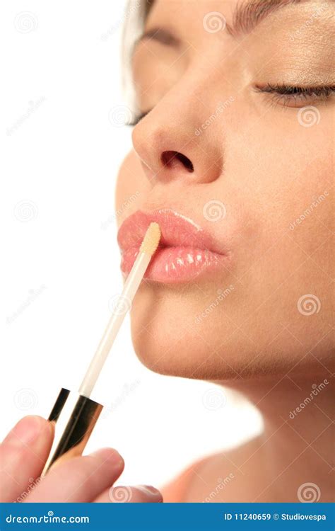 Woman Applying Lip Gloss Stock Image Image Of Color 11240659