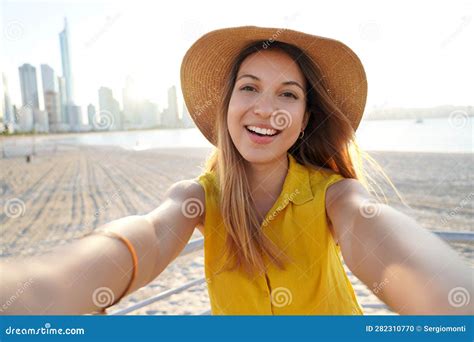 Self Portrait Of Beautiful Young Lady On The Beach At Sunset Selfie Of Authentic People