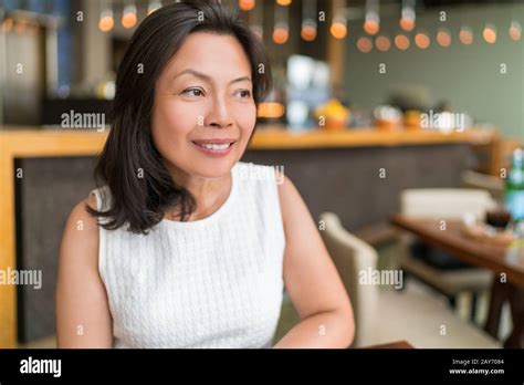 Happy Healthy Asian Middle Aged Business Woman Relaxing Inside Restaurant Beautiful Mature