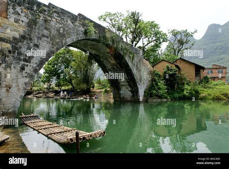 Bamboo Raft On River At Yulong Bridge Guangxi China Stock Photo Alamy