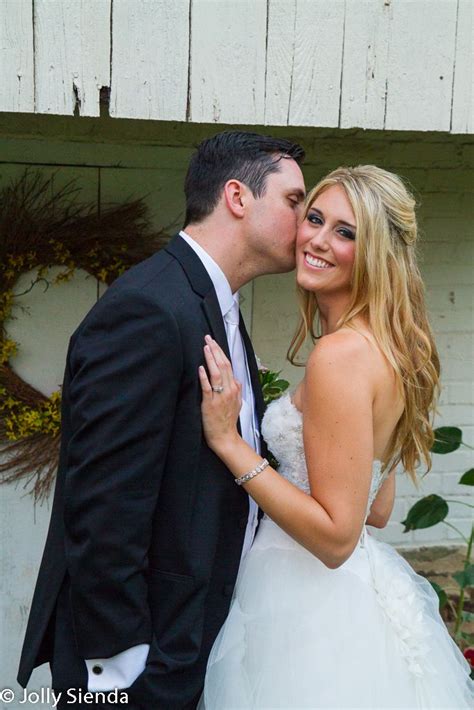 Groom Kisses His Bride On Her Cheek Bride Wedding Photography Groom