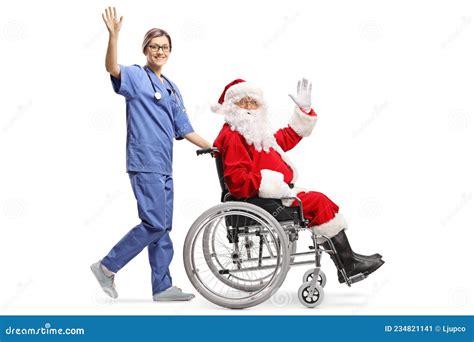 Full Length Profile Shot Of A Female Nurse Pushing Santa Claus In A