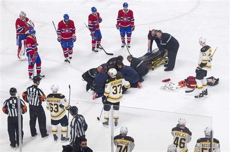 Canadiens c philip danault hit in head by a slap shot from bruins d zdeno chara. NHL Capsules: Canadiens' Phillip Danault leaves with head ...