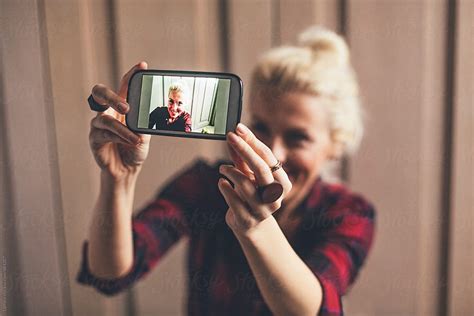 Blonde Woman Taking A Selfie By Stocksy Contributor Lumina Stocksy