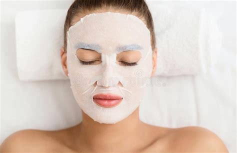 Beauty Treatment Concept Woman With Facial Sheet Mask Stock Image