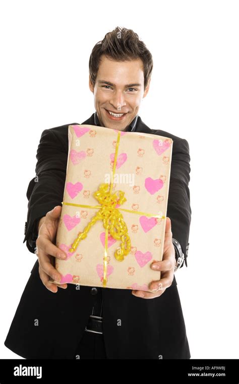 Young Man Holding Present Close Up Stock Photo Alamy