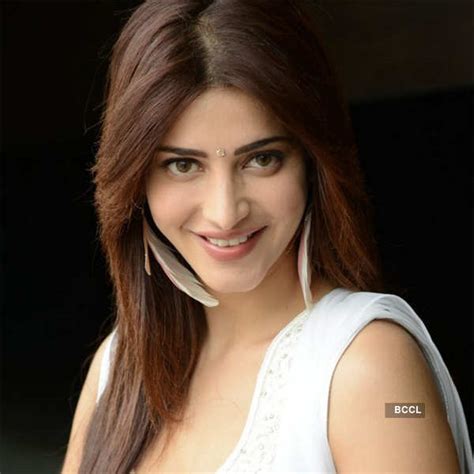 Shruti Hassan Looks Gorgeous In A White Sleeveless Dress During The Balupu Movie Interview Event