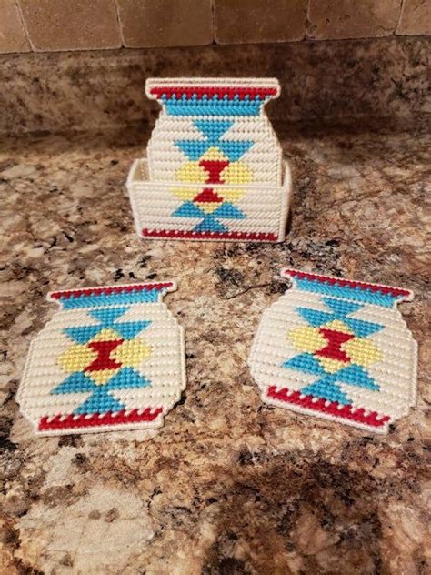 Handmade american indian unique creations including native american ojibwe birch bark baskets, the largest selection of authentic canoes, lamp shades, smudge feathers, ornaments, powwow dance sticks and fans, frames and mirrors. Native American themed coasters | Coasters, Unique gifts ...