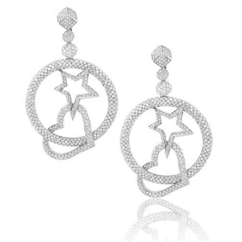 white gold heart and star earrings with brilliant cut diamonds