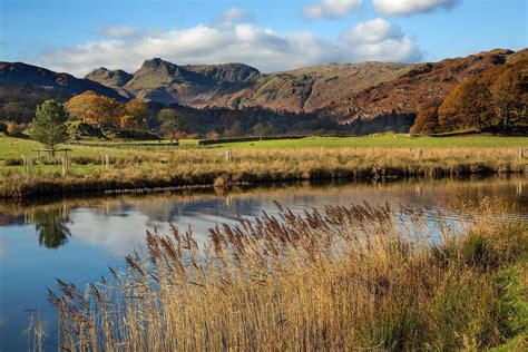 The Langdales Over The River Brathay At Elterwater Martin Lawrence