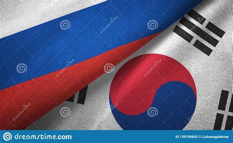 Russia And South Korea Two Flags Textile Cloth Fabric Texture Stock