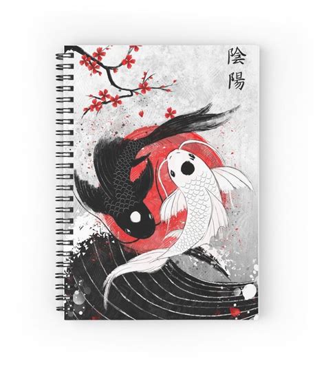 A Spiral Notebook With Two Koi Fish On It