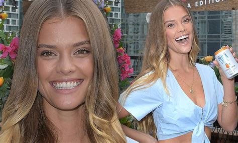 Nina Agdal Flashes Her Flat Abs In Tiny Tie Up Top As She Sips On Pura Still Spiked Water