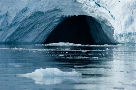 Close Up Of Cave In Arctic Ice Cliff Nick Dale Private Tutor