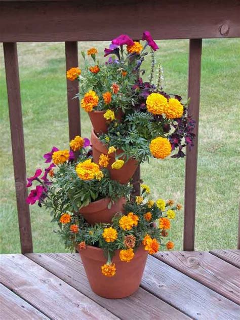 How to make your own tiered terracotta planter. Something to think about | Tiered planter, Flower pots ...