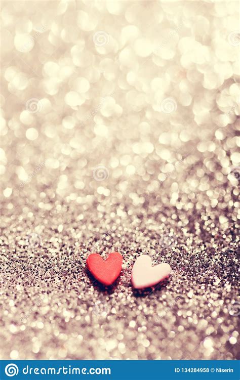 Two Hearts On Glittery Sparkly Background Stock Photo Image Of