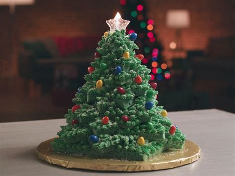 Christmas cake a rich fruit cake covered with white icing, eaten at christmas. Christmas Tree Cake Recipe | Food Network Kitchen | Food Network