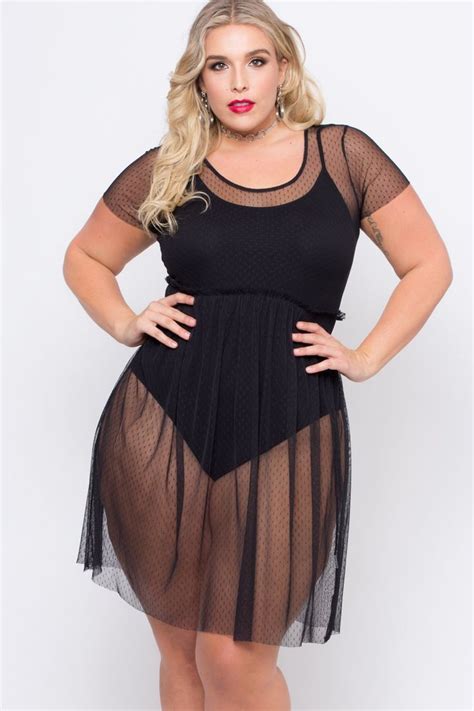 This Plus Size Stretch Knit Mesh Dress Features A Round Neckline