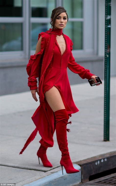 Olivia Culpo Steps Out In Quirky Scarlet Ensemble And Thigh High Boots