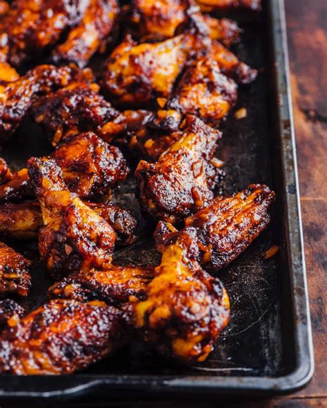 Toss out that deep fryer just like last year's jeans. Oven BBQ Chicken Wings Recipe • Steamy Kitchen Recipes ...