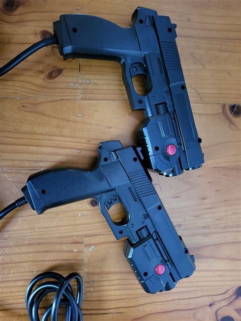 2x Ultimarc Aimtrak Black Recoil Guns With Powerpack And Suzo Happ