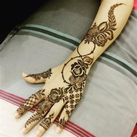 Wow! Absolutely love the design! | Rose mehndi designs ... See more ideas about floral design, floral, flower arrangements.