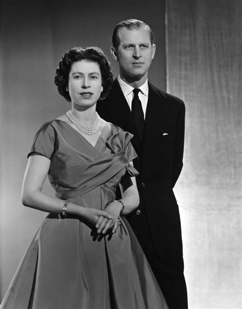Picture was possibly used to entice prospective suitors in early years of queen's reign. Signs show Prince Philip is 'still as charmed and even ...