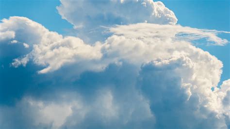 Puffy Fluffy White Clouds Blue Sky Time Lapse Motion Background Bright