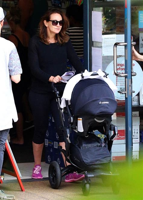 Michelle Bridges Enjoys Day Out With New Baby Axel And Partner Steve