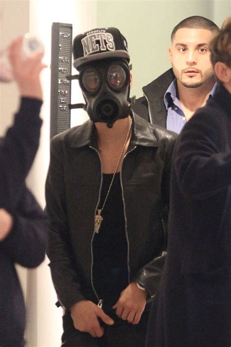 justin bieber pictured wearing a gas mask whilst out shopping in london mirror online