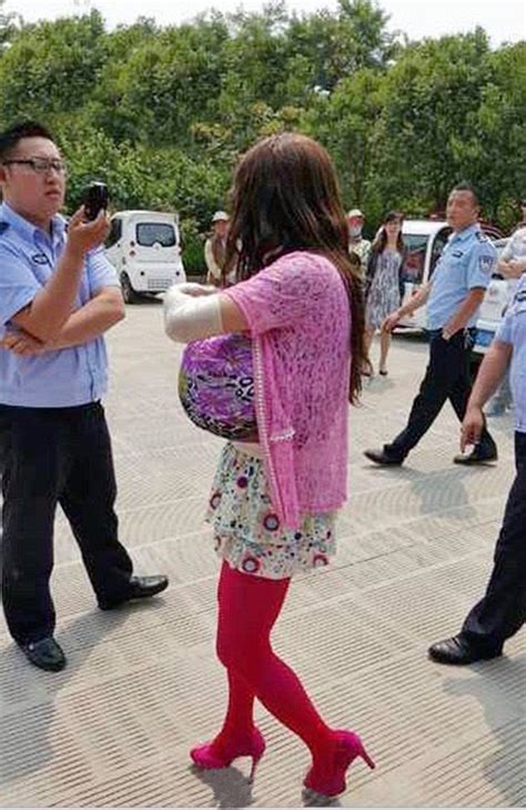 Peeping Tom In China Disguised As A Woman Is Caught Lurking In Toilets