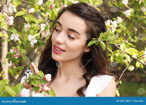 Beautiful Young Woman Near Blossoming Tree On Sunny Spring Day Stock Image Image Of Green